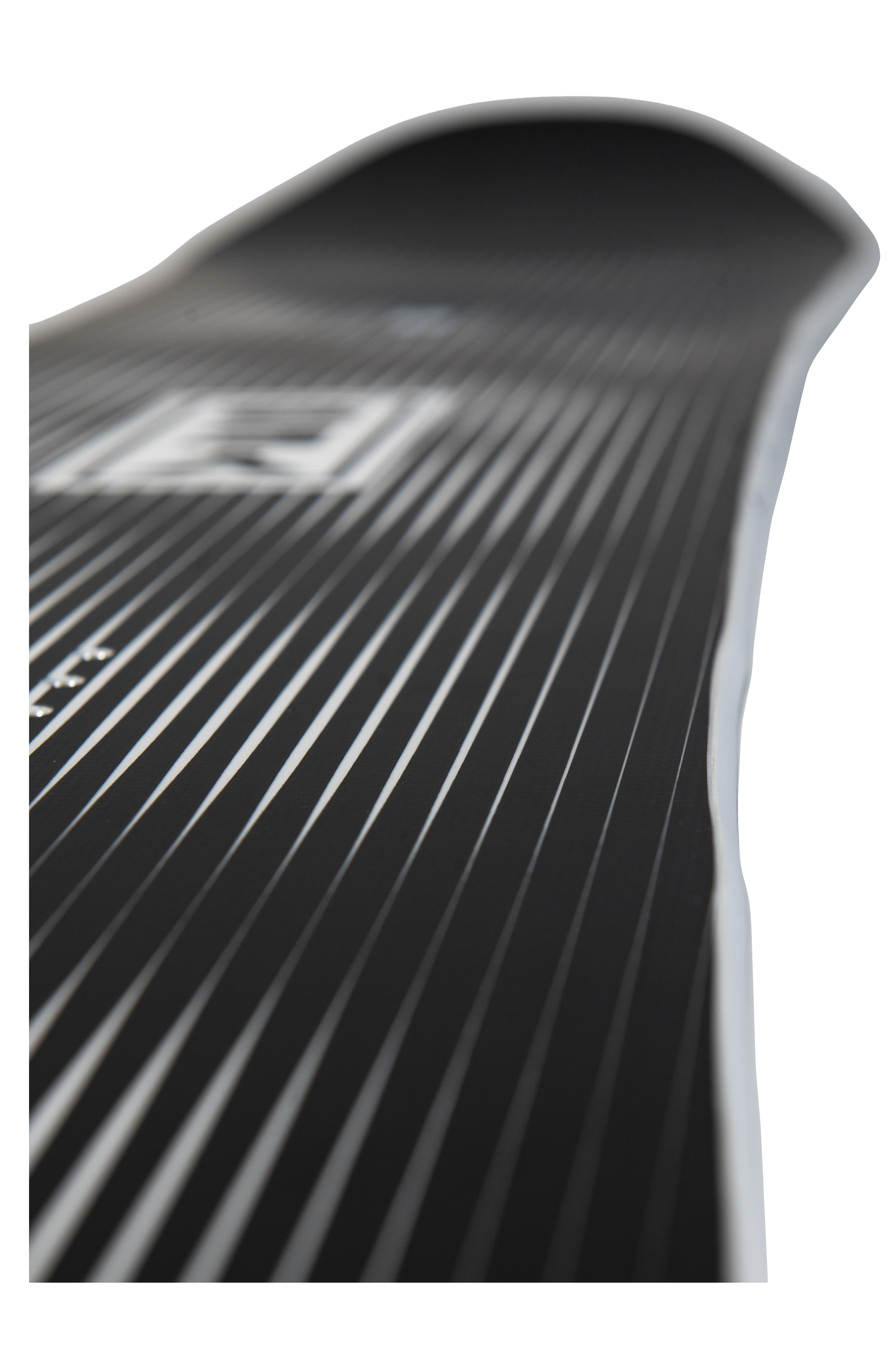 Steves snow store Wollongong - Close-up of a black snowboard with a brand logo on a white background